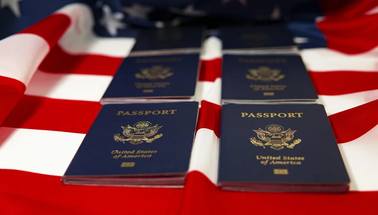 Two U.S. passports resting on an American flag