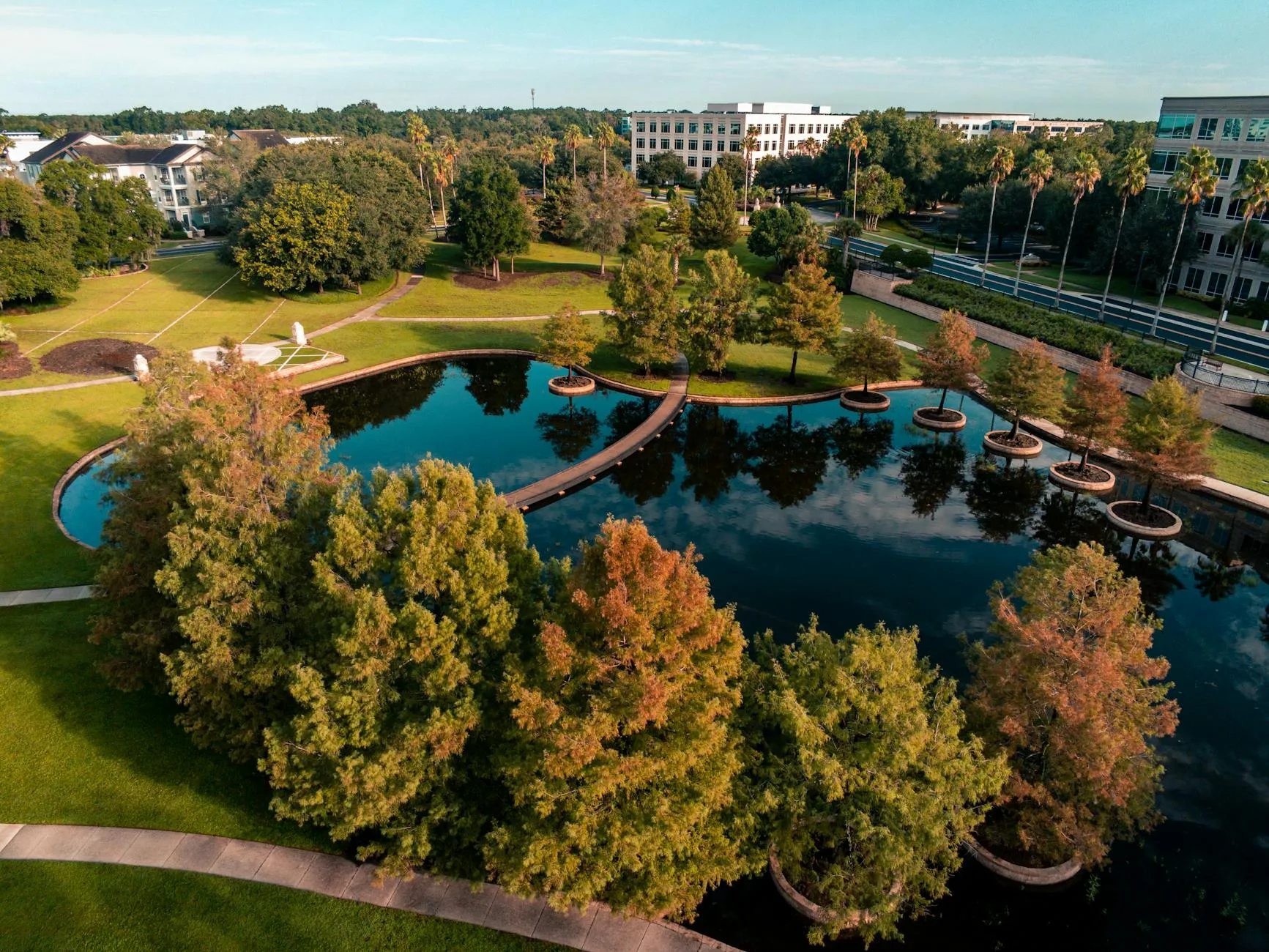 Aerial view of a park with a pond in Lake Mary, Florida, autumn foliage