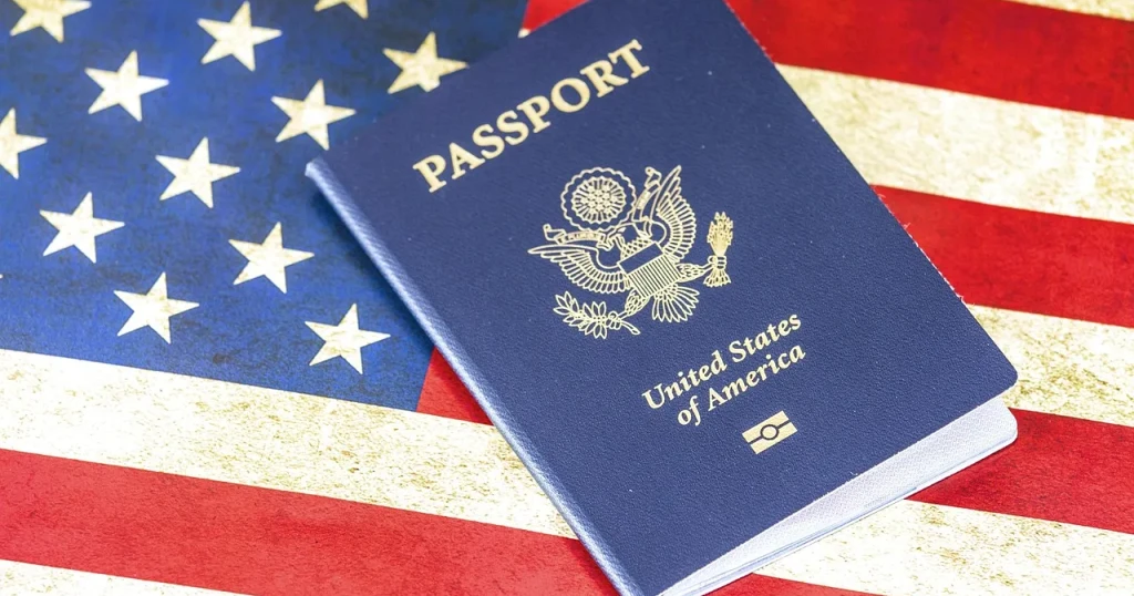 United States passport resting on an American flag
